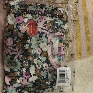 Magnetic Ruffle Butt footie. Brand new still in package. 6-9 months